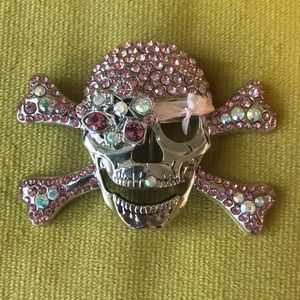 Pink and clear gem skeleton belt buckle.